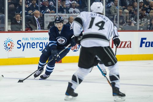 MIKE DEAL / WINNIPEG FREE PRESS
Winnipeg Jets' Jacob Trouba (8) takes the puck into Los Angeles Kings territory during an afternoon NHL game at MTS Centre Sunday.
161113 - Sunday November 13, 2016