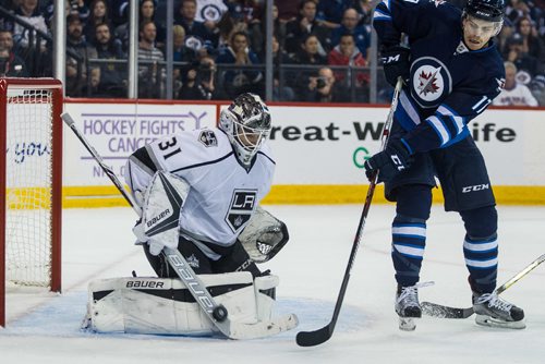 MIKE DEAL / WINNIPEG FREE PRESS
Winnipeg Jets' Adam Lowry (17) tries to get the rebound off of Los Angeles Kings' goaltender Peter Budaj (31) during an afternoon NHL game at MTS Centre Sunday.
161113 - Sunday November 13, 2016