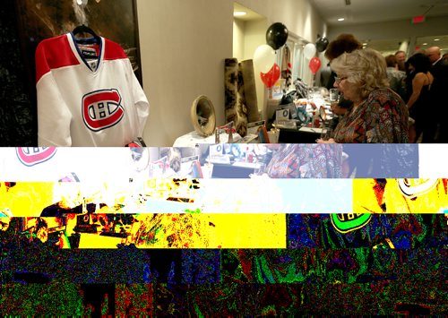 JASON HALSTEAD / WINNIPEG FREE PRESS

Items, including donations from Montreal Canadiens hockey hall-of-famer Guy Lafleur at Winnipeg Harvest's Empty Bowl Celebrity Auction on Nov. 10 at the Delta Winnipeg Hotel. (See Social Page)