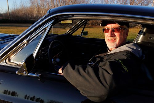 BORIS MINKEVICH / WINNIPEG FREE PRESS
CLASSIC CARS - Bruce Neufeld has a really nice black 1968 Mustang fastback. Here he sits in the car for a photo. Nov 15, 2016