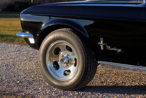 BORIS MINKEVICH / WINNIPEG FREE PRESS
CLASSIC CARS - Bruce Neufeld has a really nice black 1968 Mustang fastback. Front wheel, left, and logo, right. Nov 15, 2016