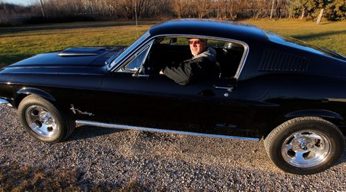 BORIS MINKEVICH / WINNIPEG FREE PRESS
CLASSIC CARS - Bruce Neufeld has a really nice black 1968 Mustang fastback. Here he sits in the car for a photo. Nov 15, 2016