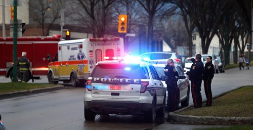 WAYNE GLOWACKI / WINNIPEG FREE PRESS

Police, Paramedics and Fire Fighters at the intersection of McPhillips St. and Redwood Ave. just before 9AM Wednesday morning. An eight-year-old child was taken to hospital after being struck by a motor vehicle.  Nov. 16 2016