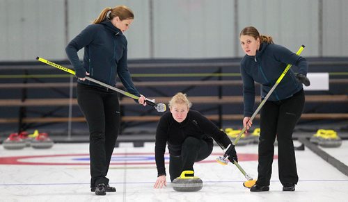 PHIL HOSSACK / WINNIPEG FREE PRESS -  Warming up for the weekend "Super Speil", Swedish skip Margaretha Sigfridsson is framed by 2nd Christina Bertrup (left) and lead Maria Wennerstroem on the practice ice in Morris Thursday afternoon. See Mike Sawatzky's story.  November 17, 201