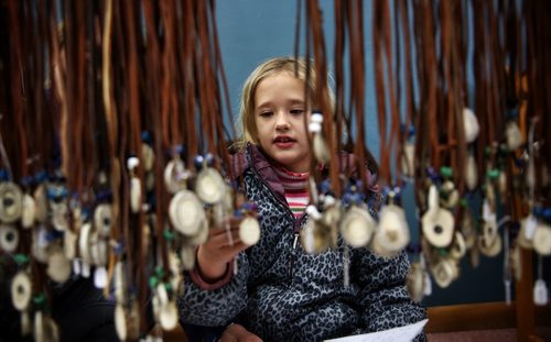 MIKE DEAL / WINNIPEG FREE PRESS

Siri Gouge, 8, looks at the Viking jewelry at the Scandinavian Cultural Centre annual Christmas Market on Erin Street Sunday afternoon. 

161120
Sunday, November 20, 2016