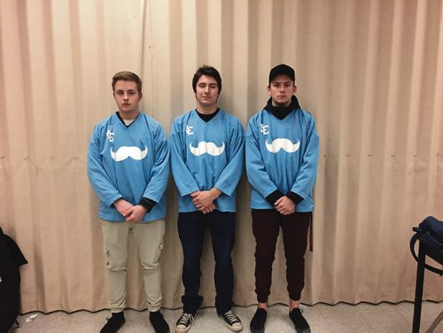 Canstar Community News Nov. 16, 2016 - Left to right, Brenden Ruchkall, Matthew Myrowich, and Kyle Jensen of the Kildonan East Reivers wearing the jerseys the team will sport during their second annual prostate cancer fundraising game against neighbourhood rivals Miles Macdonell on Nov. 25. (SHELDON BIRNIE/CANSTAR/THE HERALD)