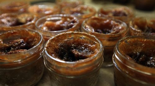 PHIL HOSSACK / WINNIPEG FREE PRESS -  Sut Ur Pie Hole.....Freshly baked Peacan Pies in a jar cool waiting for lids and labels, Shut Ur Pie Hole's makes Canned pies and more, see Dave Sanderson's story.  November 21, 201