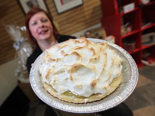 PHIL HOSSACK / WINNIPEG FREE PRESS -  Sut Ur Pie Hole.....Heather Daymond, owner, shows off a full sized lemon merangue, Shut Ur Pie Hole's makes Canned pies and more, see Dave Sanderson's story.  November 21, 201