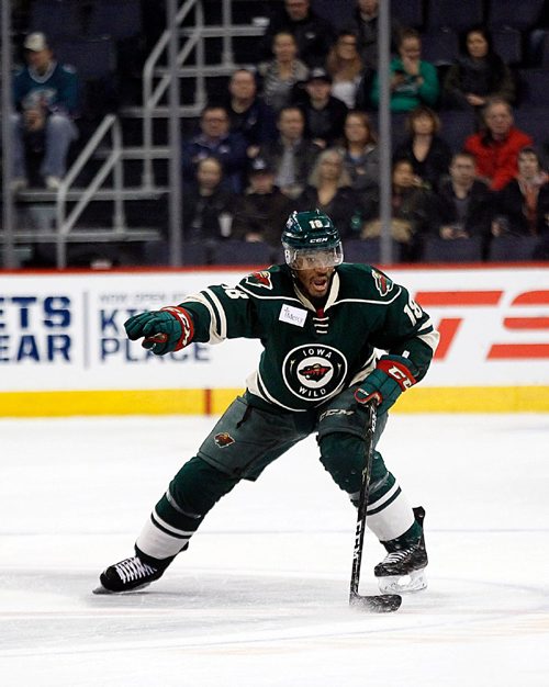 PHIL HOSSACK / WINNIPEG FREE PRESS -  Former Moose now Iowa Wild #18 Maxime Fortunus calls the shots Wednesday evening at the MTS Centre. See story. November 23, 201