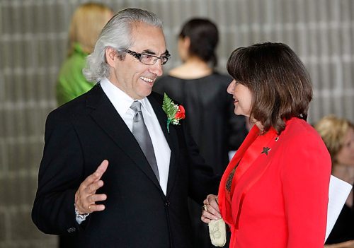 BORIS MINKEVICH / WINNIPEG FREE PRESS  080616 Gail Asper,right, chats with Phil Fontaine, left, at the Convention Centre where there is a special dinner for Fontaine.
