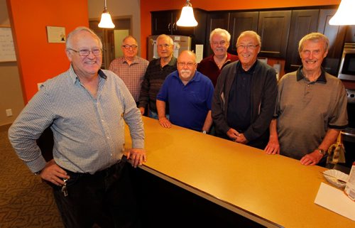 BORIS MINKEVICH / WINNIPEG FREE PRESS
VOLUNTEERS - L-R Frank Kauenhofen stands in front of the other men, Nick Zajic, Ray Rybuck, Ron Harris, George Dewandel, Bob Carter, and Mac Wilson, who help him put on the pancake breakfasts. Frank, 70, organizes the monthly pancake breakfast at the Dawson Trail Apartments on Leveque Street. These pancake breakfasts are open to the public, and the proceeds go to a different charitable organization each time. Photo taken in the common area where the breakfasts take place. Nov 25, 2016