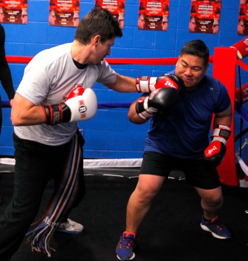 BORIS MINKEVICH / WINNIPEG FREE PRESS
North End Showdown Charity Boxing Match at North End Boxing Club, 1100 College Avenue. City Councillors Matt Allard, left, and Mike Pagtakhan, right, duke it out at the event. Randy Turner story. Nov 25, 2016