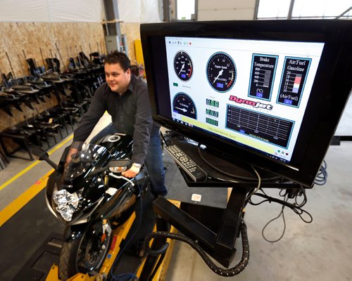 WAYNE GLOWACKI / WINNIPEG FREE PRESS

Instructor Dustin Blackwell sits on a motorcycle connected to a dynamometer that measures engine performance  in the Heavy Equipment Transportation Centre at Red River College.  This is a much smaller dynamometer compared  to the three axel dynamometer that will be installed in the new  MotiveLab. Martin Cash story 25 2016