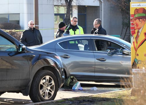 RUTH BONNEVILLE / WINNIPEG FREE PRESS

Police Identification officers investigate shooting scene on  Stradbrook Ave where 6 shot were fired at a vehicle around 3am Saturday morning sending two people to the hospital.  
Nov 26, 2016
