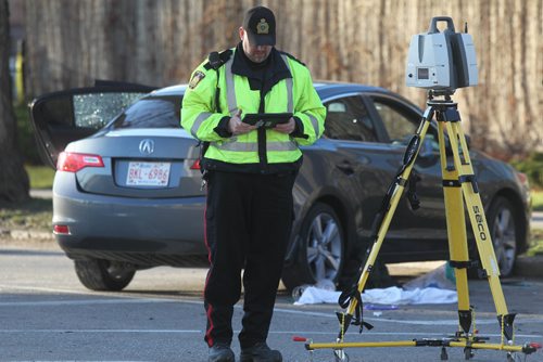 RUTH BONNEVILLE / WINNIPEG FREE PRESS

Police Identification officer investigates a shooting scene on  Stradbrook Ave where 6 shot were fired at a vehicle around 3am Saturday morning sending two people to the hospital.  

Nov 26, 2016
