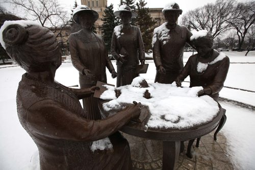 RUTH BONNEVILLE / WINNIPEG FREE PRESS


Statue of Nellie McClung with fresh fallen snow on her as she is depicted signing  the documents, with group of five suffragist's, who fought for the right for women to vote 100 years ago An official plaque commemorating the 100th Anniversary of some Manitoba women receiving the right to vote was unveiled at the Manitoba Legislative Building Tuesday.

Nov 29, 2016
