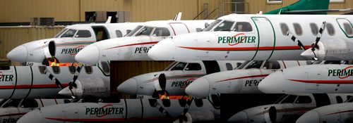 WAYNE GLOWACKI / WINNIPEG FREE PRESS
Planes at Perimeter Aviation on Ferry Rd. Kevin Rollason story November 30 2016