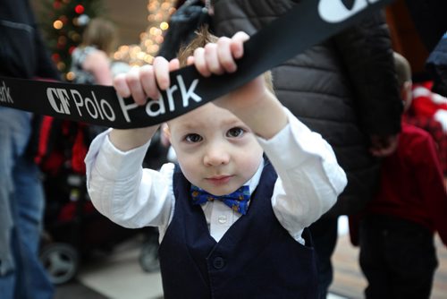 RUTH BONNEVILLE / WINNIPEG FREE PRESS


Two-year-old Keagan King waits in line with his twin brother, Ryker  (not in photo) with his dress shirt and bow tie on to see Santa and have his picture taken with him at Polo Park's Santa display Wednesday.
Standup  
Nov 30, 2016
