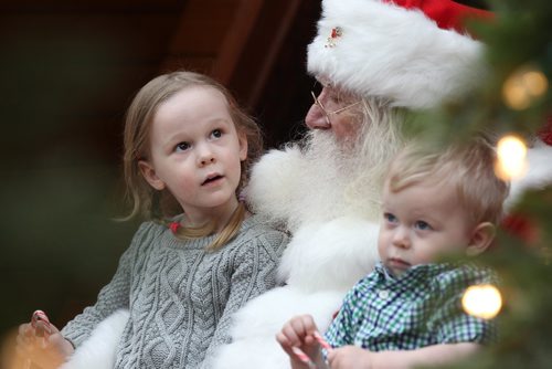 RUTH BONNEVILLE / WINNIPEG FREE PRESS


Four-year-old Aleksa Strzelczyk chats with Santa while having her picture taken with her younger brother Maksym (2yrs)  at Polo Park's Santa display Wednesday.
Standup  
Nov 30, 2016
