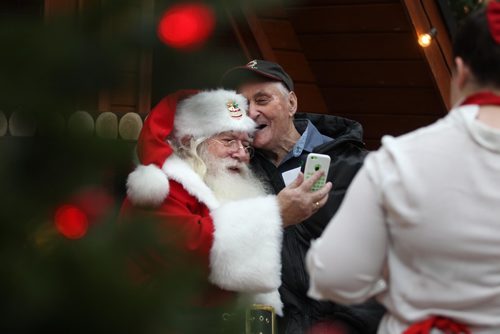 RUTH BONNEVILLE / WINNIPEG FREE PRESS


Kids young and old enjoy visiting with Santa.  Eighty six-year-old Ralph Tessier, an old friend of  Kris Kringle, has his picture taken with him siting on his lap at Polo Park's Santa display Wednesday.
Standup  
Nov 30, 2016
