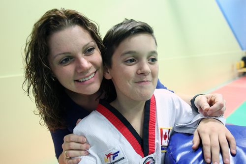 JOE BRYKSA / WINNIPEG FREE PRESS Melody Tardiff and her son Carter-before his taekwondo class at TRP Academy 1610 Regent Ave. W.- Tardiff and her husband relied on United Way services for years for Carter, and still do. He has some mental health issues, including Attention Deficit Hyperactivity Disorder. - Nov 30, 2016 -( see Alex paul story)