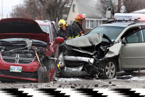 WAYNE GLOWACKI / WINNIPEG FREE PRESS 

The southbound traffic lanes on McPhillips St. at Bannerman Ave. were closed for awhile Friday morning after two vehicles collided. Three people were transported to the hospital in stable condition.¤Dec. 2 2016
