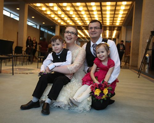 RUTH BONNEVILLE / WINNIPEG FREE PRESS

Chris and Lisa Herie with their kids son - Tiernan, 5yrs, and daughter - Dahlia, 2yrs, are all smiles after their marriage at City hall on Friday afternoon.  They are the first couple to be married in a civil ceremony at City Hall with friends, family, mayor Brian Bowman and the media there to capture the moments event.  
See Jen Zoratti's story.  
Dec 2, 2016
