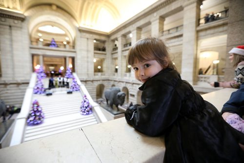 RUTH BONNEVILLE / WINNIPEG FREE PRESS


Madeleine Law, who is almost 4yrs, watches her grandmother sing on the steps of the Legislative Building with  Wing and a Prayer assemble while visiting the Manitoba Legislative Building's Annual Open House with her family Saturday.  

Standup
Dec 3, 2016
