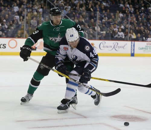 RUTH BONNEVILLE / WINNIPEG FREE PRESS

Manitoba Moose #38 B Lemieux tries to get control back of the puck as Texas Stars #39 D. Stevenson is on his tale during the 2nd period at MTS Centre Saturday.   The Texas Stars won the game 6 -1.  

Dec 3, 2016

