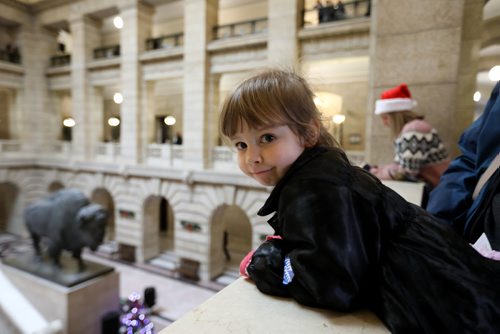RUTH BONNEVILLE / WINNIPEG FREE PRESS


Madeleine Law, who is almost 4yrs, watches her grandmother sing on the steps of the Legislative Building with  Wing and a Prayer assemble while visiting the Manitoba Legislative Building's Annual Open House with her family Saturday.  

Standup
Dec 3, 2016
