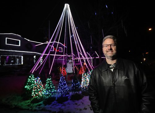 TREVOR HAGAN / WINNIPEG FREE PRESS
Michael Geiger-Wolf and his 200,000-light Christmas light display, Saturday, December 3, 2016.