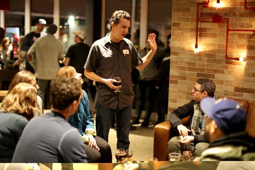 TREVOR HAGAN / WINNIPEG FREE PRESS
Chris Young, brewmaster, talking with customers inside the new tap room at Half Pints Brewery, Saturday, December 3, 2016. For Ben column