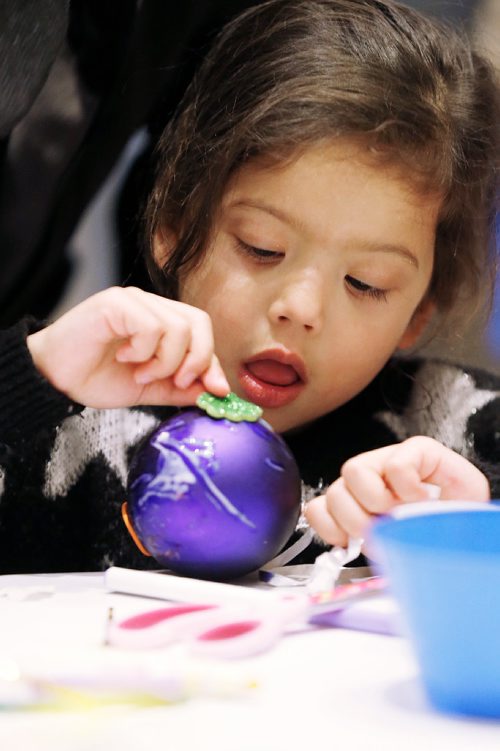 JOHN WOODS / WINNIPEG FREE PRESS
Three year old, Madison, makes decorations at the Winnipeg Art Gallery's Holiday Party Sunday, December 4, 2016. Families enjoyed a mug of hot cocoa, cookies, and crafts, as they came together to celebrate another Christmas season.
