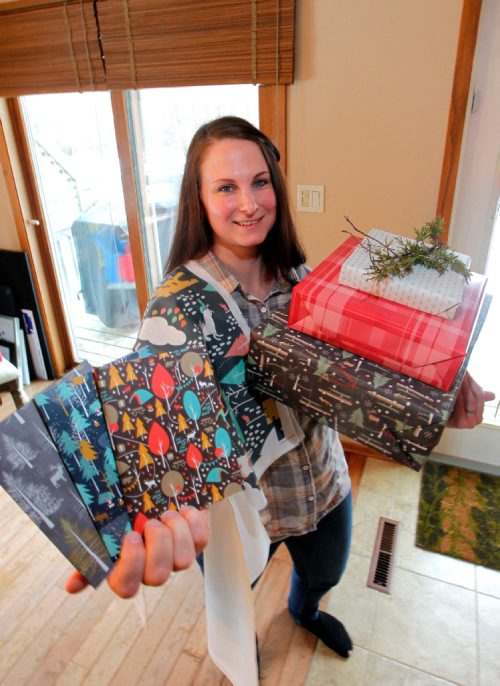 BORIS MINKEVICH / WINNIPEG FREE PRESS
Intersection. Leanne Thiessen, owner of Paper Canoe - a paper and fabric design company, creates patterns which she shares on-line and through some exclusive outlets in Manitoba and NW Ontario. Here she poses for a photo with some of her products. Her designs are bought by people around the globe and turned into curtains, clothes, pillows, you name it. She also has her own line of paper products - including Xmas gift wrap. Dave Sanderson story. Dec. 5, 2016