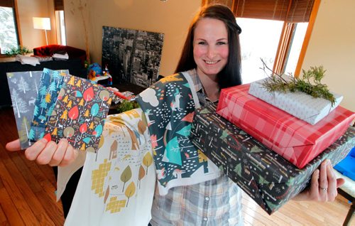 BORIS MINKEVICH / WINNIPEG FREE PRESS
Intersection. Leanne Thiessen, owner of Paper Canoe - a paper and fabric design company, creates patterns which she shares on-line and through some exclusive outlets in Manitoba and NW Ontario. Here she poses for a photo with some of her products. Her designs are bought by people around the globe and turned into curtains, clothes, pillows, you name it. She also has her own line of paper products - including Xmas gift wrap. Dave Sanderson story. Dec. 5, 2016