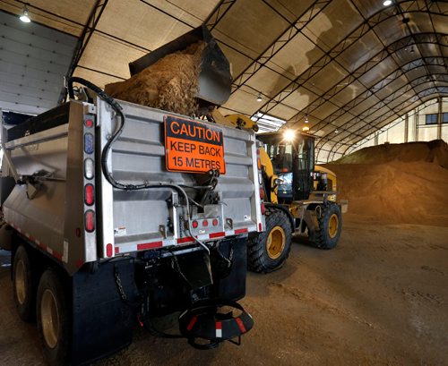 WAYNE GLOWACKI / WINNIPEG FREE PRESS

Sand and salt is loaded into a sanding truck at the City facility on Pacific Ave.in preparation for the expected snow storm this week.  Rebecca Dahl  story  Dec. 5 2016