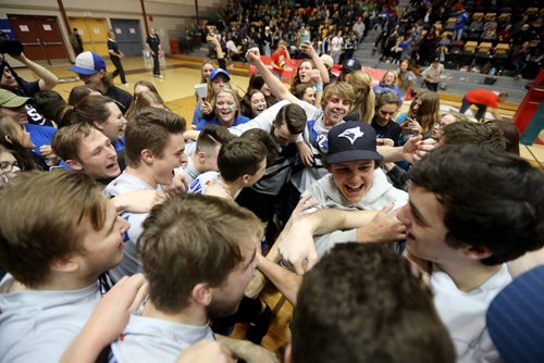 TREVOR HAGAN / WINNIPEG FREE PRESS
The Lord Selkirk Royals celebrate after defeating the Miles Macdonell Buckeyes in the provincial volleyball championship, Monday, December 5, 2016.