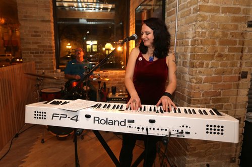 JASON HALSTEAD / WINNIPEG FREE PRESS

Singer/songwriter Lindsey White (right) and Mitch Dorge perform at Nine Circles Community Health Centres World AIDS Day Crimson & Cocktails mixer on Dec. 1, 2016, at Forth in the Exchange District. (See Social Page)