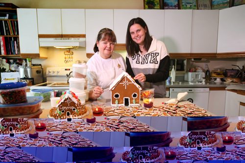 RUTH BONNEVILLE / WINNIPEG FREE PRESS

Leslie Carey Dessler loves to make elaborate, homemade gingerbread men and houses  that takes over part of her house and life every year before Christmas.  With her daughter, Julianne, helping.  
See Carol Sanders story. 
Dec 7, 2016
