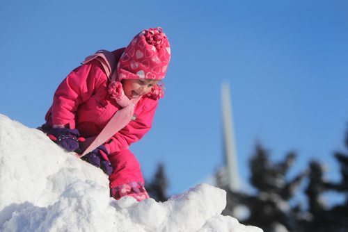 RUTH BONNEVILLE / WINNIPEG FREE PRESS

Lucy Granove - 4yrs, enjoys climbing on the mountains of snow at The Forks before attending her dance class while with her parents Saturday.  
 
Standup weather  photo 
Dec 9, 2016