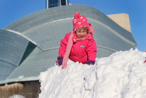 RUTH BONNEVILLE / WINNIPEG FREE PRESS

Lucy Granove - 4yrs, enjoys climbing on the mountains of snow at The Forks before attending her dance class while with her parents Saturday.  
 
Standup weather  photo 
Dec 9, 2016