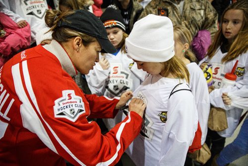 MIKE DEAL / WINNIPEG FREE PRESS
Cassie Campbell-Pascall an Olympian hockey star (2 golds and a silver) signs autographs after inspiring over 300 female minor hockey players at the Scotiabank Girls HockeyFest on Sunday at the MTS Iceplex.
161211 - Sunday, December 11, 2016.