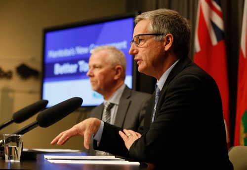 WAYNE GLOWACKI / WINNIPEG FREE PRESS

  At right, Blaine Pedersen, Minister of Infrastructure and Doug McMahon, Assistant Deputy Minister, Manitoba Infrastructure Water Management and Structures Division at the  Manitoba flood forecast new conference in the Manitoba Legislative Building Tuesday. Kristin Annable story Dec. 13 2016

