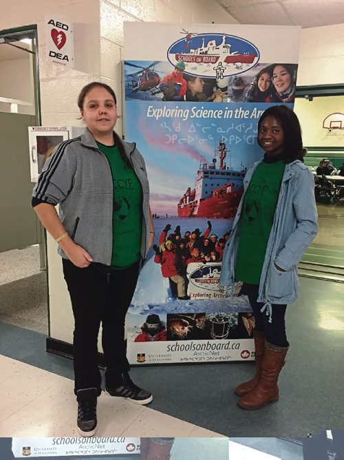 Canstar Community News Dec. 5, 2016 -Shaelie Nilles (left) and Zainab Kagbanda are Grade 12 Elmwood High School students who helped organize the Arctic Climate Change Youth Forum at the school. (SHELDON BIRNIE/CANSTAR/THE HERALD)