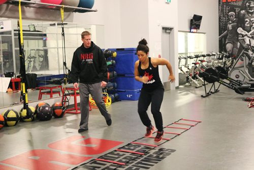 Canstar Community News Desiree Scott does some ladder workout at NRG Athletes Therapy Fitness on Dec. 8, 2016.