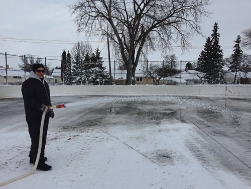 Canstar Community News Dec. 8, 2016 - After clearing a heavy snowfall, icemaker Terry Stafekis begins flooding the first of North Kildonan Community Centre's four skating rinks. Stafekis said Dec. 8 is the latest he's ever started flooding in the 33 years he's been doing the NKCC rinks. (SHELDON BIRNIE/CANSTAR/THE HERALD)