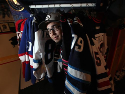 PHIL HOSSACK / WINNIPEG FREE PRESS -   Kyle Calder, who has converted his basement into the second coming of the MTS Centre; lines painted on the floor... hockey boards as walls... TV as game clock etc etc Dave Sanderson story.  - December 13, 2016