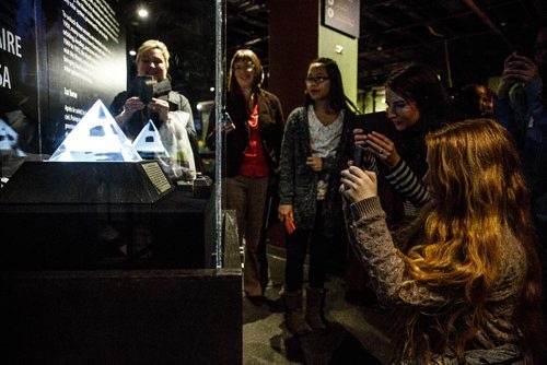 MIKE DEAL / WINNIPEG FREE PRESS
Students from Elmwood HS take turns checking out a moon rock at the Manitoba Museum Wednesday. The Manitoba Museum has added a temporary exhibit in the Science Gallery showcasing a rock collected during the Apollo 17 mission to the Moon. The loan from NASA can be seen in the Science Gallery until June 25, 2017.
161214 - Wednesday, December 14, 2016.