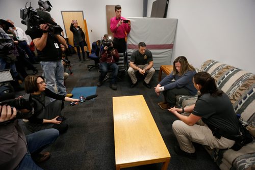 WAYNE GLOWACKI / WINNIPEG FREE PRESS


In centre seated , Leonie (declined to give her last name) plays a victim role with Winnipeg Police Constables Sabrina Masi,right, and Kent Neville as they take part in mental health awareness training at Police HQ Wednesday.  Ashley Prest story Dec. 14 2016