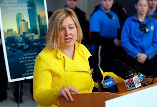 BORIS MINKEVICH / WINNIPEG FREE PRESS
Winnipeg Police Service Announces Downtown Safety Strategy. Press conference took place on the main floor of the Manitoba Hydro building downtown. CentreVenture CEO Angela Mathieson addresses the crowd attending. ALDO SANTIN STORY. Dec. 15, 2016